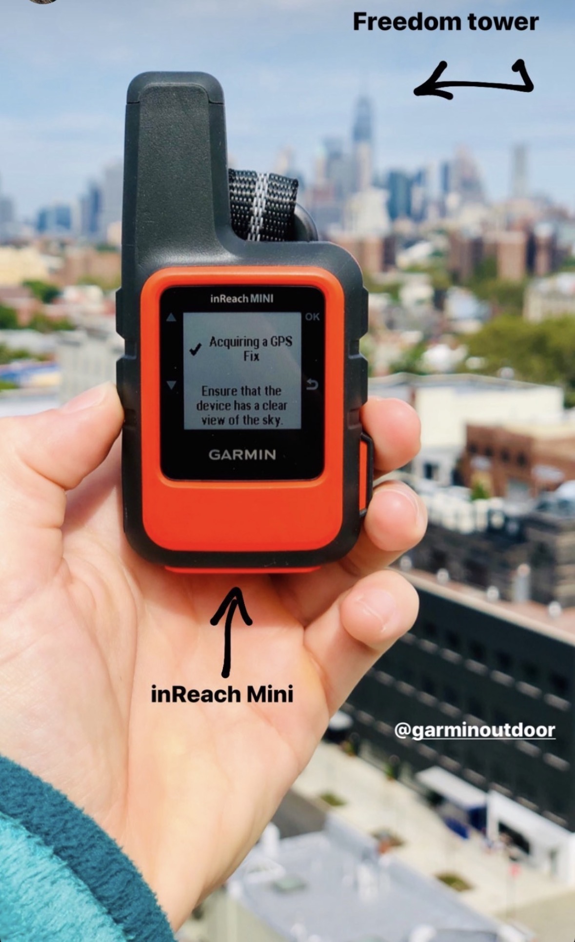 Garmin inReach Mini shown in a city demonstration, not on the Dix Range trail